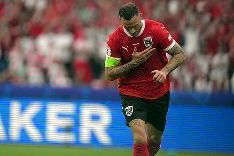 Marko Arnautovic celebrates after scoring a goal